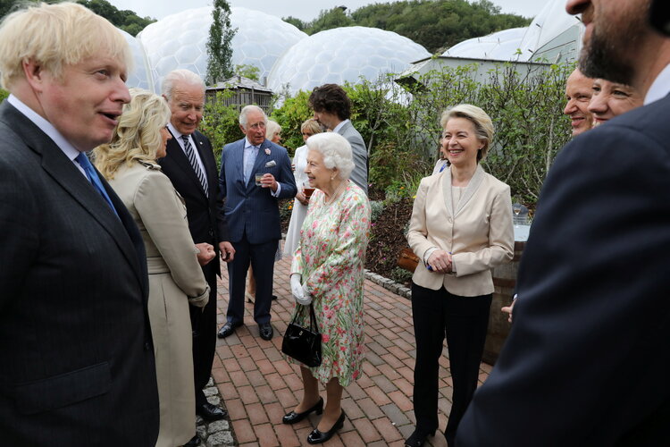 Britain’s Prime Minister Boris Johnson, U.S. President Joe Biden and his wife Jill Biden, European Commission President Ursula von der Leyen and Canada’s Prime Minister Justin Trudeau along with Britain’s Queen Elizabeth and Prince Charles attend a drinks reception on the sidelines of the G7 summit, at the Eden Project in Cornwall, Britain June 11, 2021.